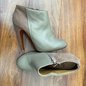 Gray and tan leather heeled booties